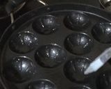 A picture of step 5 of Eggs Masala Paniyaram/Paddu: Muttai Paniyaram.
