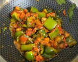 A picture of step 10 of Capsicum Tomato Rice.