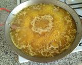 A picture of step 4 of Paella with Easy Homemade Broth.