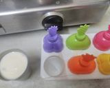 A picture of step 5 of Lychee kulfi in muti-coloured chia seeds pond.