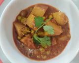 A picture of step 11 of Aloo Matar.