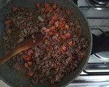 Foto del paso 2 de la receta: Salsa con carne y longaniza