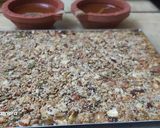 A picture of step 6 of Nutty seedy Healthy chikki.