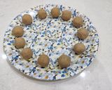 A picture of step 5 of Magaj Ladoo (Wheat flour ladoos).
