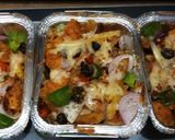 A picture of step 8 of Chessy pizza fries.