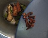 A picture of step 1 of Haldi-Tulsi Kadha.