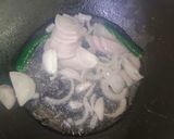 A picture of step 3 of Achari chicken.