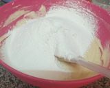 A picture of step 3 of Blueberry loaded Streusel Muffins.