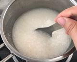 Hình bước làm 3 của món Cháo mực cà rốt cho bé từ 9 tháng trở lên
