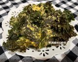 A picture of step 9 of Crispy Kale Chips.