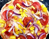 A picture of step 4 of My little Alfrado Pizza with 2 Cheese & Tomato 😘.
