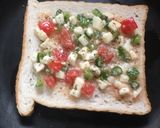A picture of step 4 of Egg Chilli Cheese Toast.
