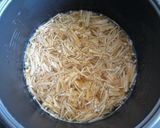 A picture of step 4 of Enoki Rice.