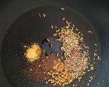 A picture of step 1 of Aachari Bhindi.