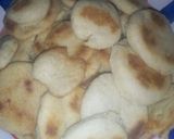 A picture of step 15 of Semolina cookies with chocolate syrup.