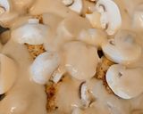 A picture of step 3 of Chicken & mushroom Traybake.