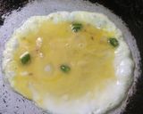 A picture of step 3 of Kolkata Style Egg roll.