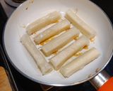 A picture of step 6 of Rice Paper wrapped Paneer Fingers.