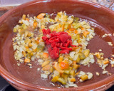 Foto del paso 3 de la receta: Arroz meloso de pulpo y gambones al ajillo