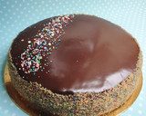 Foto del paso 16 de la receta: Bizcocho multicolor con cobertura de chocolate