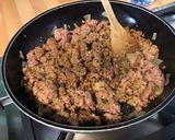 Une image de l'étape 8 de Porc aux tomates séchées, ail mariné, oignon et épices italiennes.