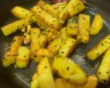 A picture of step 2 of Onion stalk stir fried with Potato.