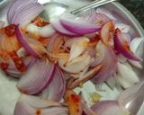 A picture of step 1 of Schezwan onion fritters.