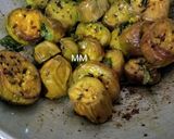 A picture of step 3 of Dahi Baingan with roasted cumins powder.