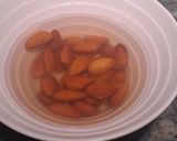 A picture of step 1 of Hershey 's cocoa almond shake.