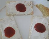 A picture of step 3 of #GA4 WEEK10 Sky flake cracker topped with cream cheese & avocado.