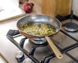 A picture of step 1 of Rich's Eggs Masala.