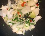 A picture of step 4 of Fried pork ribs with garlic and onion.