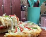A picture of step 6 of Cheesy Chicken Tikka Pizza 🍕.