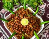 A picture of step 7 of Steam-Fried Wheat and Black Chickpea Masala Ghughri.