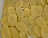 Foto del passaggio 3 della ricetta Tiella di patate, riso e carciofi