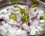 A picture of step 1 of Summer cool onion tomato raita.