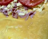 Foto del paso 6 de la receta: Omelette de jamón, tomate, roquefort y muzzarella a la plancheta