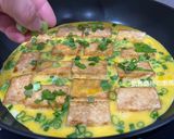 A picture of step 7 of Pan-Fried Tofu and Eggs with Oyster Sauce.
