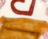 A picture of step 21 of Chicken vegetable roll.