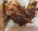 A picture of step 2 of Fried yam,egg with onion sauce.