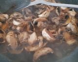 A picture of step 5 of My Slowcooked Smoked Paprika Chicken and Mushrooms in Wine Sauce.