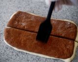 A picture of step 11 of Mini and Cute Cocoa Marble Bread | used two loaf pans.