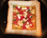 A picture of step 5 of Cheese Tomato Egg Toast.