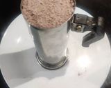 A picture of step 5 of Kerala brown rice puttu.