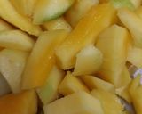 A picture of step 2 of Raw mango stuffed bittergourd.