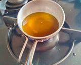 A picture of step 2 of Raw turmeric amla ginger and green chilli pickle.