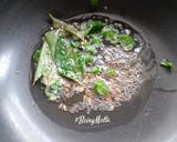 A picture of step 1 of Bhutte Ka Kees.