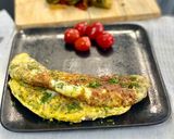 Une image de l'étape 3 de Omelette roulée au fromage.