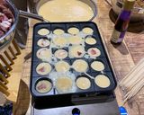 A picture of step 5 of Takoyaki using plain flour / octopus balls 🐙.