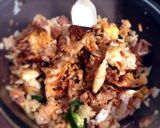 A picture of step 4 of Slight Spice Egg and Tuna Rice Bowl.